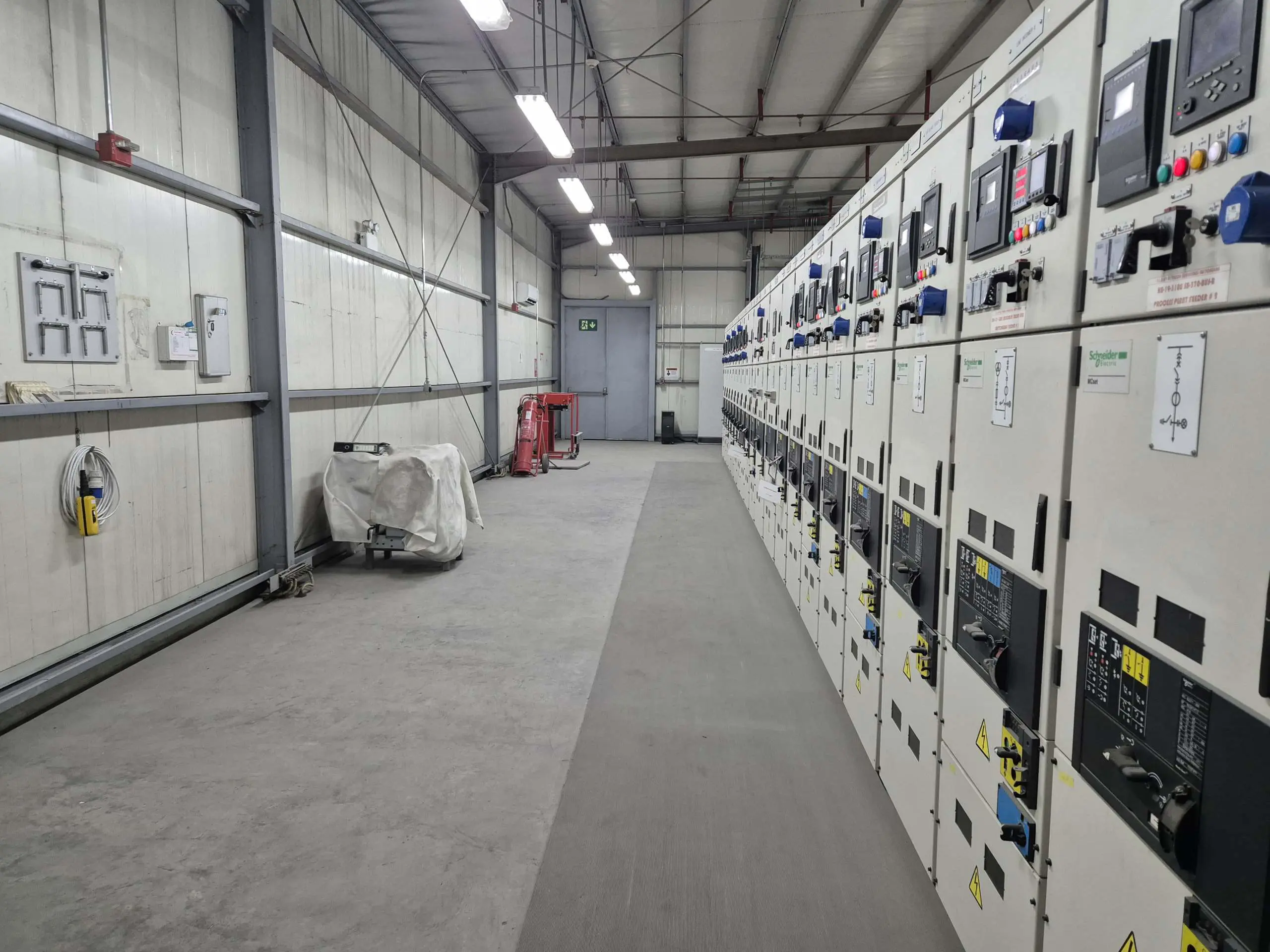Jabal Sayid switchroom equipment. Interior view of high-voltage switchgear room undergoing upgrades.